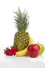 Colourful fresh fruits white background