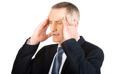 Businessman suffering from headache
