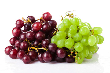 Black and white grapes isolated on white background