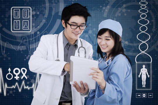 Doctor with tablet and futuristic interface background - Powered by Adobe
