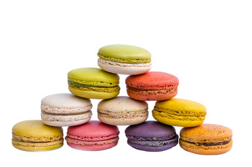 Colorful macarons on white background