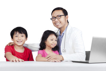 Friendly doctor with children 2