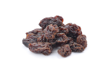 Dried raisins on a white background