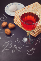 Jewish holiday Passover celebration with matzo and wine