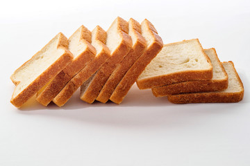 Sliced bread on white background