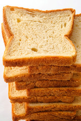 Sliced bread on white background