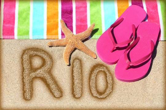 Rio beach vacation concept - flip flops and towel