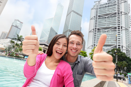 Happy Thumbs Up Multicultural Couple In Hong Kong