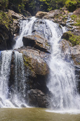 Obraz premium Water falling in their huge waterfall