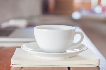 White coffee cup on work station