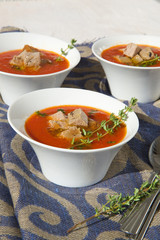 Tomato cream soup with tuna and thyme