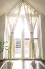 bed room curtains with sun rays