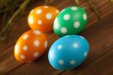 Easter eggs on wooden boards