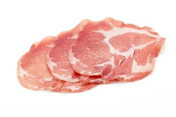 Dried pig meat slices. Delicatess.