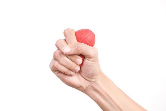 Hands of a woman squeezing a stress ball