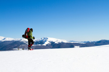 Winter hiking in snowshoes.