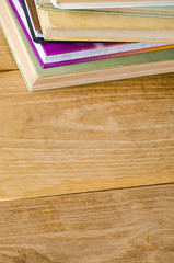 Obraz na płótnie Canvas stack book on wooden table