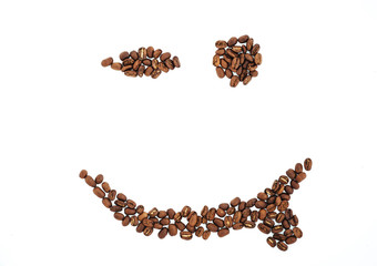 Grains of coffee in the form of smiling face isolated. coffee