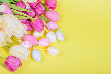 Fototapeta na wymiar Easter multicolored tulips and eggs