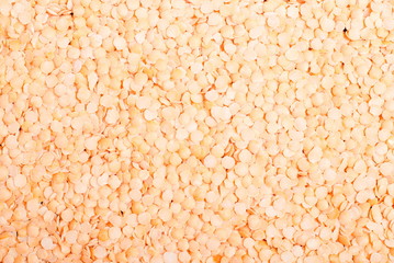 raw lentils is scattered in the background