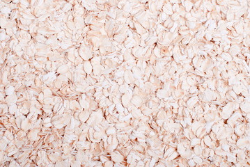 raw oatmeal expanded in the background