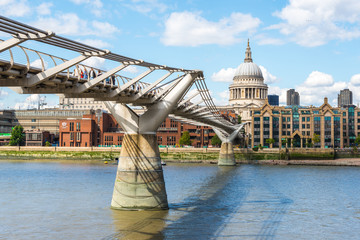 St Paul's Cathedral and the Millennium Bridge in London - 78577596
