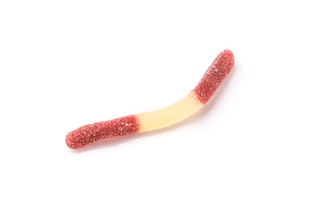 Brown and white sugar jelly candy strip over white background