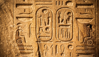 old egypt hieroglyphs carved on the stone