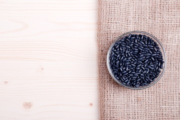 raw black beans on the board diet food