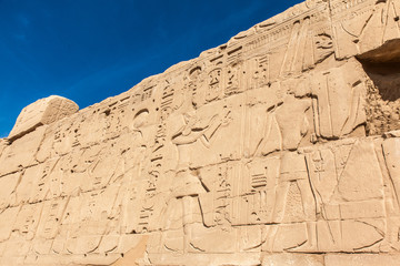 old egypt hieroglyphs carved on the stone