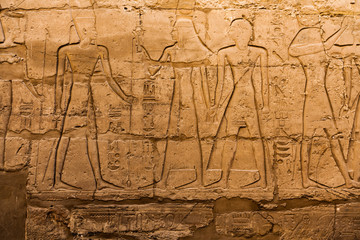 old egypt hieroglyphs carved on the stone