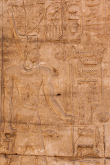 old egypt hieroglyphs carved on the stone