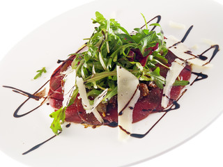 beef carpaccio with rocket salad