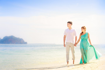 Fototapeta premium young happy asian couple on honeymoon