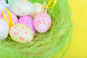 Easter eggs in green nest