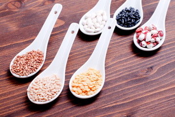 mix of different cereals on the board dietetic food