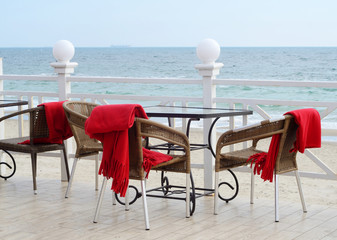 Empty tables at outdoor hotel restaraunt on the beach,Odessa