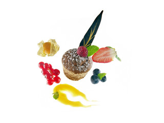 chocolate glazed cupcake with fresh fruits