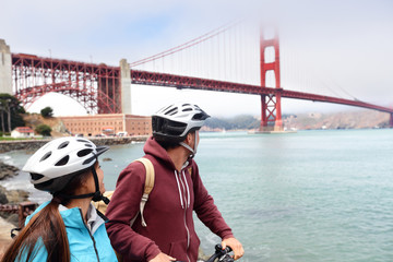Golden gate Bridge biking tourists on guided tour