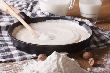preparation of bechamel sauce in a pan, horizontal