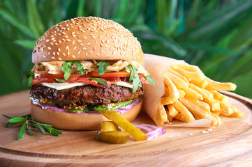 Tasty hamburger and french fries - 78587934