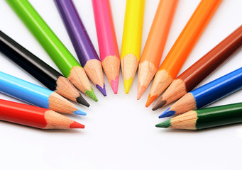 many different colored pencils with white background