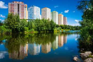 Fototapeta premium Beautiful colorful nature in among the tall buildings