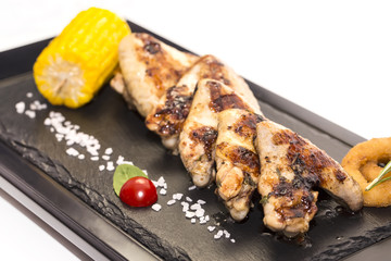 chicken wings are grilled