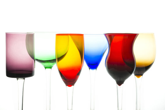 Neatly arranged colorful cocktail glasses