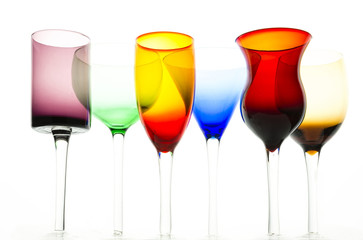 Under view on colorful cocktail glasses
