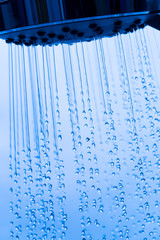 Obraz na płótnie Canvas Shower Head with Running Water