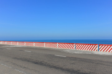 Street , ocean , horizon background