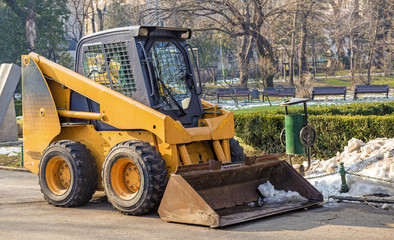 Machinery ready for snow cleaning in a romanian park