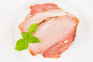 The baked pork and basil leaves